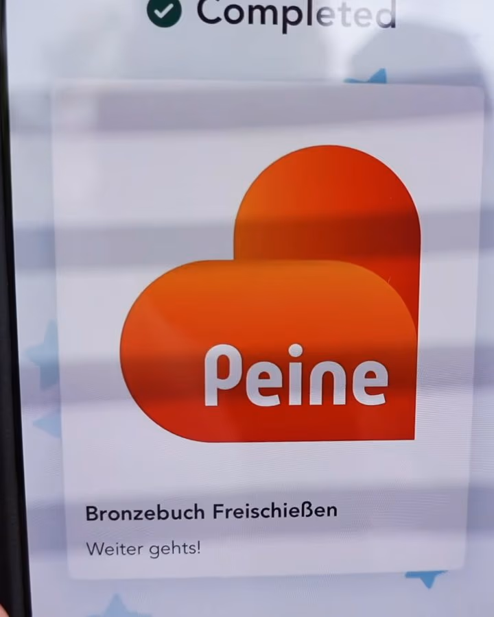 Station geschafft: Die App zeigt das Logo der Stadt